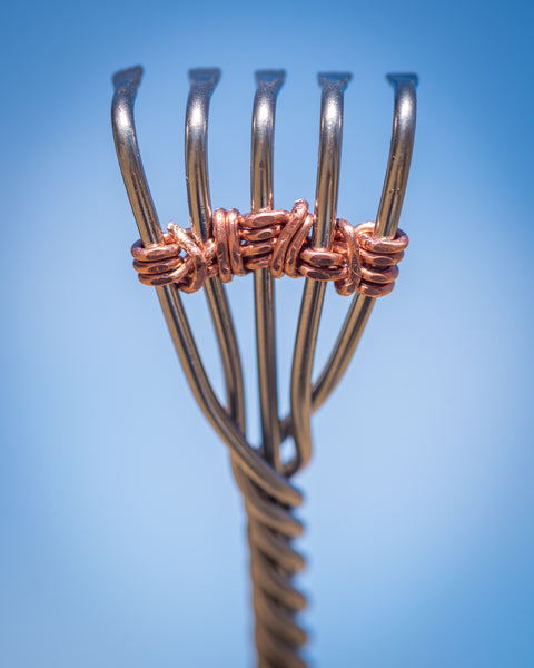 Heavy Duty Knuckles back scratcher doesn't need to be telescoping to reach the itch